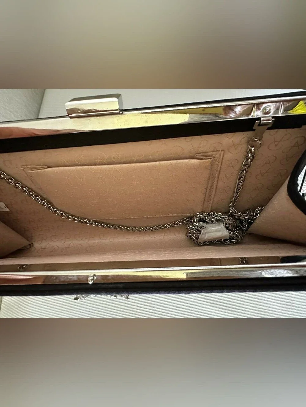 Women Black Papell Clutch Features  Prominent Crystal-embellished Brooch Closure